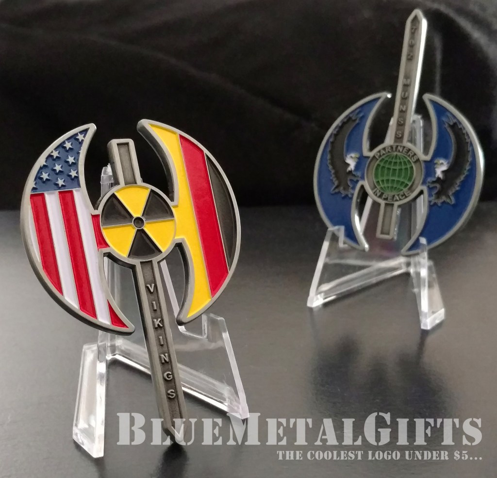 702 MUNSS Challenge coin 52 Partners in Peace Vikings battle axe battleax battle ax sword US Germany US Flag USA German flag bald eagles bald eagle globe radiation icon radioactive icon BlueMetalGifts.com www.bluemetalgifts.com